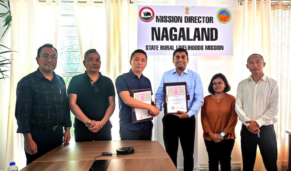 NSRLM, Industree Foundation officials pose for a photo after singing the MoU in Kohima on July 11.